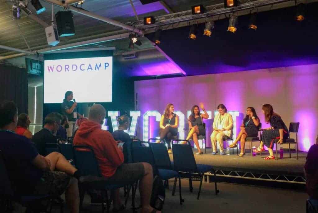 Vineeta Waving and rest of the girls in the panel sitting at WordCamp brighton