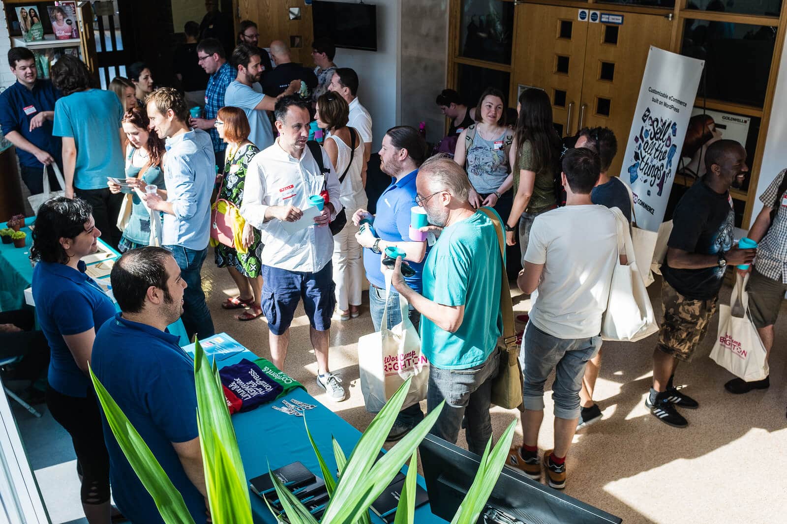 Crowd in the foyer at WordCamp Brighton