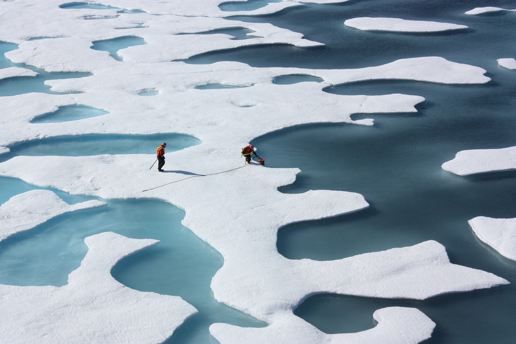 Scientists investigate arctic sea ice melt ponds