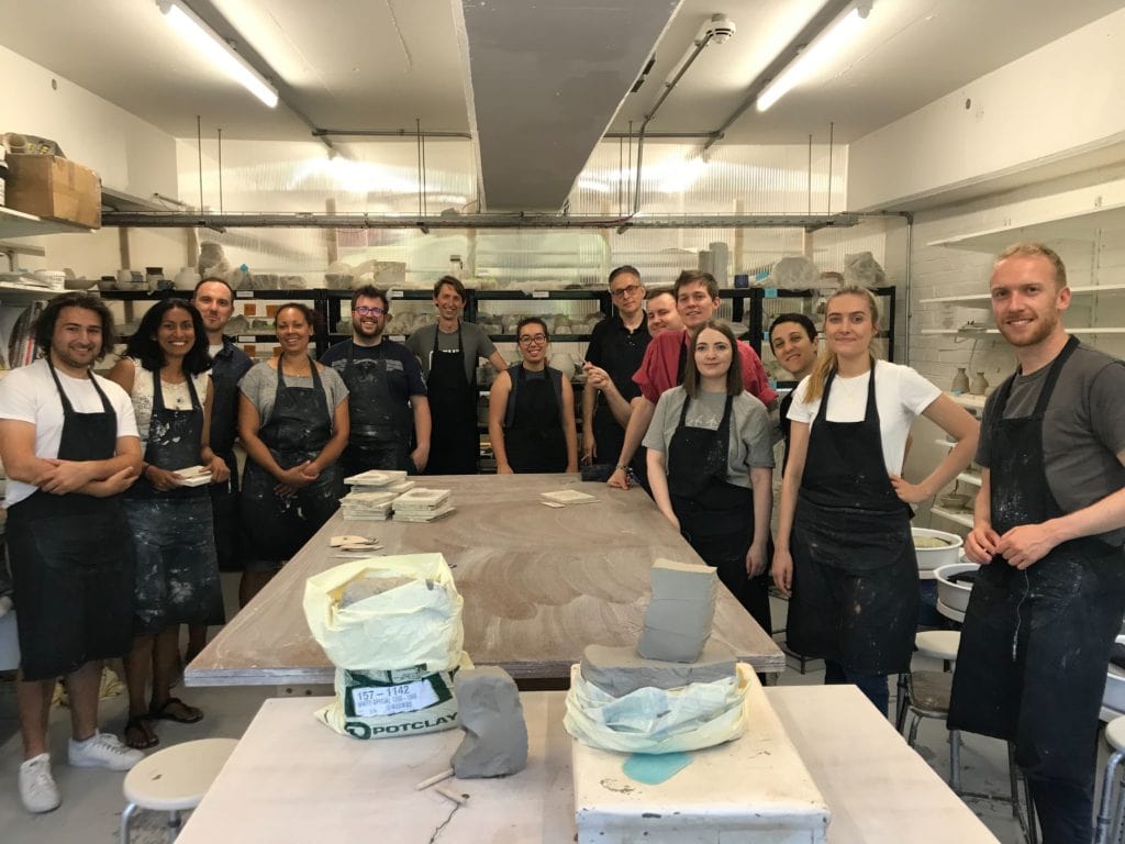 The team in the pottery workshop on our team day