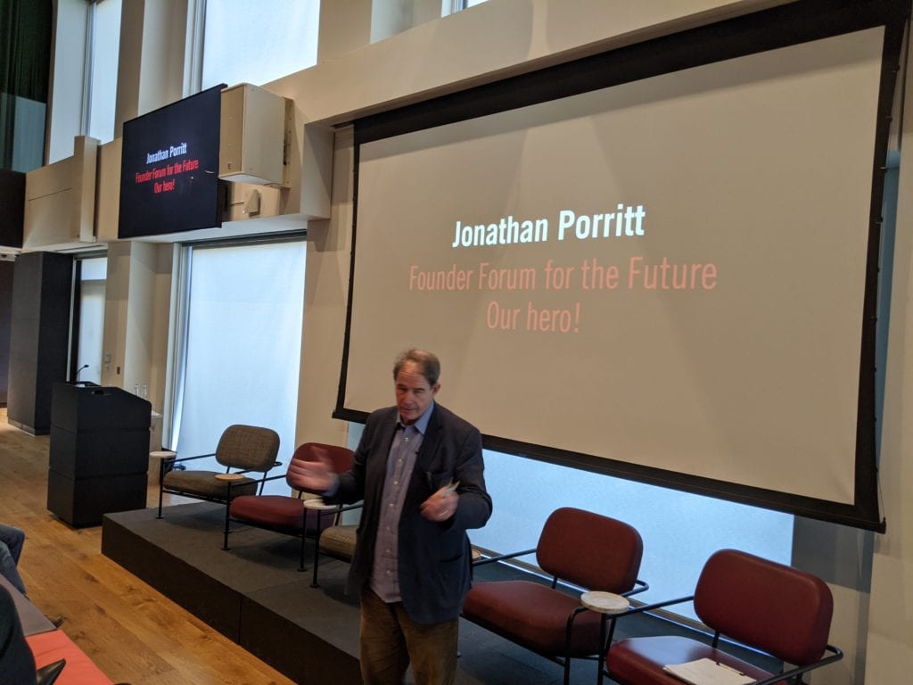 Standing in front of a screen Jonathan Porrit Forum for the future