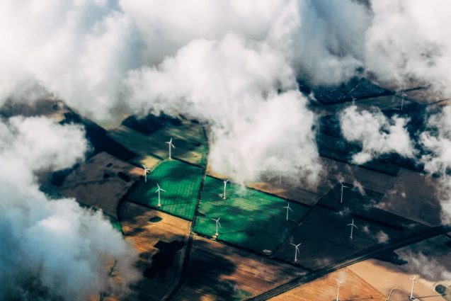 image of wind turbines in a field