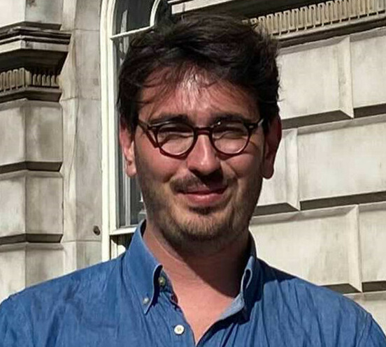 Patrick Davis - photo of a gentleman wearing a blue shirt