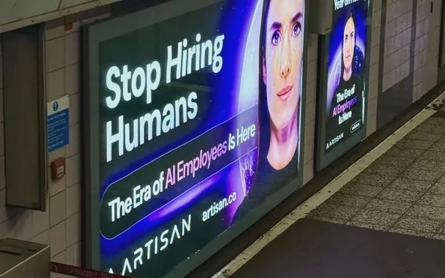 Image of a Billboard from an AI company encourgaing us to Stop Hiring Humans